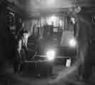 View: s40748 Swift Levick and Sons Ltd., Clarence Steel Works, Foley Street showing molten steel running from the ladle into ingot molds c.1960