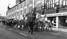 View: s41194 Demonstration by University of Sheffield students passing the Alliance Insurance Brokers on West Street