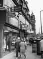 View: s41415 Shops on Pinstone Street showing (No.74) Herbert Brown, jeweller and pawnbroker and (No.70) Thorntons Confectioners 