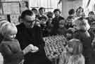 View: s41426 Shrove Tuesday oranges distributed to the children of St. Mary's C. of E. School, Cundy Street, Walkley by the vicar, the Rev. Peter Webster