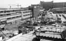 View: s41855 Construction of the new Pond Street bus station (centre) showing Royal Mail sorting office (left), Heriot House, Pond Hill (centre middle) with Park Hill and Hyde Park Flats (top)