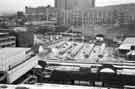 View: s41857 View from Arundel Gate of the construction of the new Pond Street Bus Station (centre) showing Park Hill Flats (top middle) and Hyde Park Flats (top left)