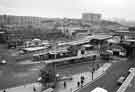 View: s41869 Pond Street bus station showing (left centre) City Council Housing Department Offices, former Joseph Rodgers and Sons Ltd., cutlery manufacturers, Sheaf Island Works and Park Hill Flats (top left) and Norfolk Park Flats (top right)