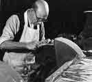 Buffing the handle of a knife before the final polishing,  Walker and Hall Ltd., Electro Works, Eyre Street