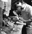 View: s42949 Craftsman cutting a new buffing tool, Walker and Hall, Ltd., Electro Works, junction of Howard Street and Eyre Street 