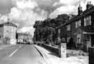 View: s43069 Sheephill Road. Ringinglow showing (left) the Ringinglow Round House and (centre) Norfolk Arms public house, Ringinglow Road 