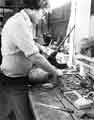 View: s43228 Frank Carr junior, putting the rivet through and onto a butcher scale handled knife, Joseph Elliot and Sons Ltd,, Sylvester Works, cutlery manufacturers, Sylvester Street