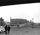 View: s43397 View from the Canal Basin of Park Hill flats showing (left) Duke Street and (centre) Shukers of Sheffield Ltd., motor engineers and commercial motor body builders, Nos.50-60 Broad Street and South Street 