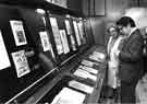 View: s43601 Caxton Printing Exhibition, main foyer, Central Library, Surrey Street showing (l.to r.) librarians Enid Gilberthorpe and David Bromley