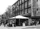 View: s43603 Deaf Awareness Week marquee, The Moor showing (right) Debenhams, department store