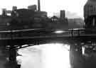 View: s43891 Footbridge over the River Don looking towards the Wicker and Nursery Street showing (left) No.108 Manchester Hotel and Crown Corn Mills, John Aizlewood Ltd., flour millers, (also called Provender Mill) 