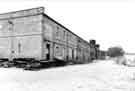 View: s43943 Hillsborough Barracks. View towards Rudyard Road showing the back of the troopers and officers stables