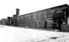 View: s43996 Clock tower and troopers stables viewed from the Langsett Road side of the artillery parade ground, Hillsborough Barracks. 