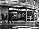 View: s44119 Bell Brothers and Co., jewellers, (No.17) and Eve Brown, costumier (No.19) Market Place