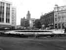 View: s44122 Construction of Castle Square showing (right) shops on High Street (No.43) Swears and Wells Ltd., furriers, (No.45) H.Samuel, jewellers, (No.47) Manfield and Sons Ltd., shoe shop and Midland Bank and (left) J.Walsh and Co., department store