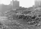 View: s44293 Excavations in Pond Street showing (top left) the College of Technology and (top right) The Central Library 