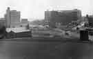 View: s44308 Construction of Arundel Gate showing (left) College of Technology and (right) the Lyceum Theatre