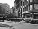 View: s44313 Construction of Castle Square showing (top left) High Street and Midland Bank Ltd., (centre) and No.17 Bell Brothers and Co., jewellers and Yorkshire Insurance House