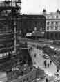 View: s44324 Construction of Castle Square showing (left) the construction of the new J. Walsh and Co., department store and (centre) l. to r. shops on High Street, No 45a, Bewlay (Tobacconists) Ltd., No 47, Manfield and Sons Ltd., shoe shop and Midland Bank Ltd.