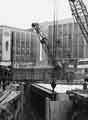 View: s44331 Construction of Castle Square showing (back left) Guardian Royal Exchange Assurance and (back right) Peter Robinson Ltd., department store, Nos. 51 - 57 High Street