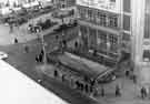 View: s44359 View from High Street of the construction of Castle Square and subway showing (left) Fitzalan Square and King Edward VII Memorial and (centre) No. 4 Marples Hotel