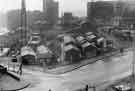 View: s44361 View of the construction of Arundel Gate at junction with Norfolk Street showing (left) the College of Technology and (right) the Lyceum Theatre