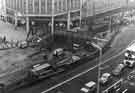 View: s44366 View of the construction of Castle Square showing (top left) Nos. 51 - 57 Peter Robinson Ltd., fashion department store, and (right) Nos. 59 - 65 C.and A. Modes Ltd.,department store, High Street 