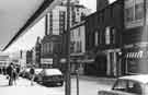 View: s44412 Cambridge Street showing (r. to l.) No.16 Faulkners Billiards Hall above the Nameless Restaurant, No.22 E.and G. Jewellers and No.24 The Sportsman (formerly the Sportsman's Inn), 