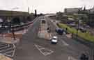 View: s44421 Junction of (top) Derek Dooley Way and Furnival Road showing (right) construction of offices for the Halifax Building Society and (left) the railway arches under the old Victoria Station