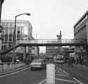 View: s44469 Footbridge over Haymarket showing (right) Nos.12-18 British Home Stores and (centre) Castle Market