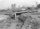 View: s44478 Construction of Tinsley subways, Sheffield Road showing (back) Tinsley Cooling Towers