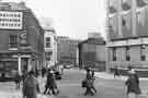 View: s44553 Surrey Street at the junction (left) with Norfolk Street showing (No.117) Hibbert Brothers, art dealers, (right) Town Hall extension (known as the Egg Box (Eggbox)) and (centre) Central Library and Sheffield Hallam University