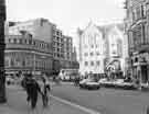 View: s44627 Surrey Street looking towards (centre) Fargate and the entrance to Orchard Square shopping centre and (centre left) Leopold Street showing (right) Yorkshire Bank Chambers