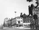 View: s44628 Junction of (left) Leopold Street and (right) Fargate showing No.70 H.L. Brown and Son, jewellers and No.66 Western Jean Company, fashion shop