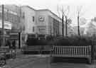 View: s44631 Seating and flower planters on The Moor showing (left) No.73 Cavendish, furniture dealer and (centre) Lloyds Bank Ltd. and junction with Earl Street