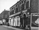 View: s44650 Devonshire Street showing (left) No.150 Mr. Kites Celebrated Wine Bar and Bistro Restaurant at the junction with Broomhall Street and (centre) Sheffield Combined Charities shop