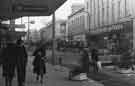 View: s44666 Shops on The Moor showing (right) Nos. 43-51 British Home Stores and (centre) Nos.37-41 Harris Carpets