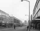 View: s44670 Shops on The Moor showing (left to centre) No.71 John Collier, tailors, No.73 Cavendish, furniture shop, No. 83 Lloyds Bank Ltd.and (right) N.64 G.A.Dunn and Co., mens outfitters