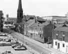 View: s44737 Carver Street showing No.69  Sheffield Metal Company Ltd., warehouse; Nos. 61-49, Samuel Staniforth Ltd, cutlery forgers and St. Matthews' C.of E.Church