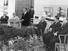 View: s44869 Unidentified meeting in the Graves Art Gallery showing (l.to r.) Clifford Warman, City Engineer, Alderman Grace Tebbutt, Alderman Isidore Lewis, Alderman James Wilfred Sterland, Bernard Warren, unknown and (standing by door) Arthur Goldsboro