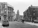 View: s44874 Surrey Street showing (left) Nos.49 - 55 Halifax Building Society and (right) No.117 Hibbert Brothers, picture framers and fine art dealers at the junction with Norfolk Street