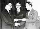 View: s45567 Presentation of Long Service Award by (centre) Mr G. M. and (right) Mr. D. G. Flather, W. T. Flather Ltd., Bright Steels, Sheffield Road, Tinsley