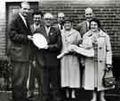 View: s45579 Retirement presentation to (third left) Mr Sidney Stevens, W. T. Flather Ltd., Bright Steels, Sheffield Road, Tinsley