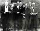 View: s45583 Retirement presentation to Mr J. Simms, Mr O. Hills and Mr J. Turton by (third left) Mr. D. G. Flather, W. T. Flather Ltd., Bright Steels, Sheffield Road, Tinsley