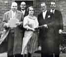 View: s45585 Retirement presentation to (first left) Mr J. Thompson and (centre) Mrs E. Torr by (second right) Mr. D. G. Flather, W. T. Flather Ltd., Bright Steels, Sheffield Road, Tinsley