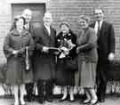 View: s45586 Retirement presentation to (third right) Mrs M. Hill by (third right) Mr D. G. Flather, W. T. Flather Ltd., Bright Steels, Sheffield Road, Tinsley 