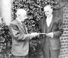 View: s45588 Retirement presentation to (left) Mr Jack Gillat by (right) Mr D. G. Flather, W. T. Flather Ltd., Bright Steels, Sheffield Road, Tinsley