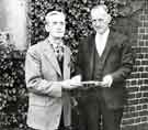 View: s45589 Retirement presentation to (left) Mr Jim Roberts by (right) Mr D. G. Flather, W. T. Flather Ltd., Bright Steels, Sheffield Road, Tinsley 