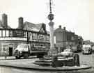 View: s45700 Royal Hotel, No. 10 Market Square, Woodhouse, at junction of Cross Street showing (centre) Woodhouse Market Cross and (right) Melia's Supermarket