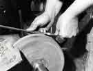 Grinding a scissor flat, Frank Turton Ltd., scissor manufacturer, Butcher Works, No.72 Arundel Street